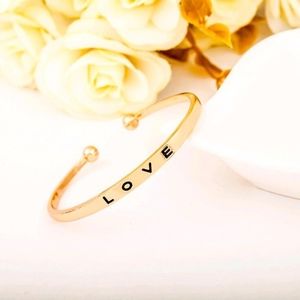 Love Engraved Open Bangle Bracelet in Gold